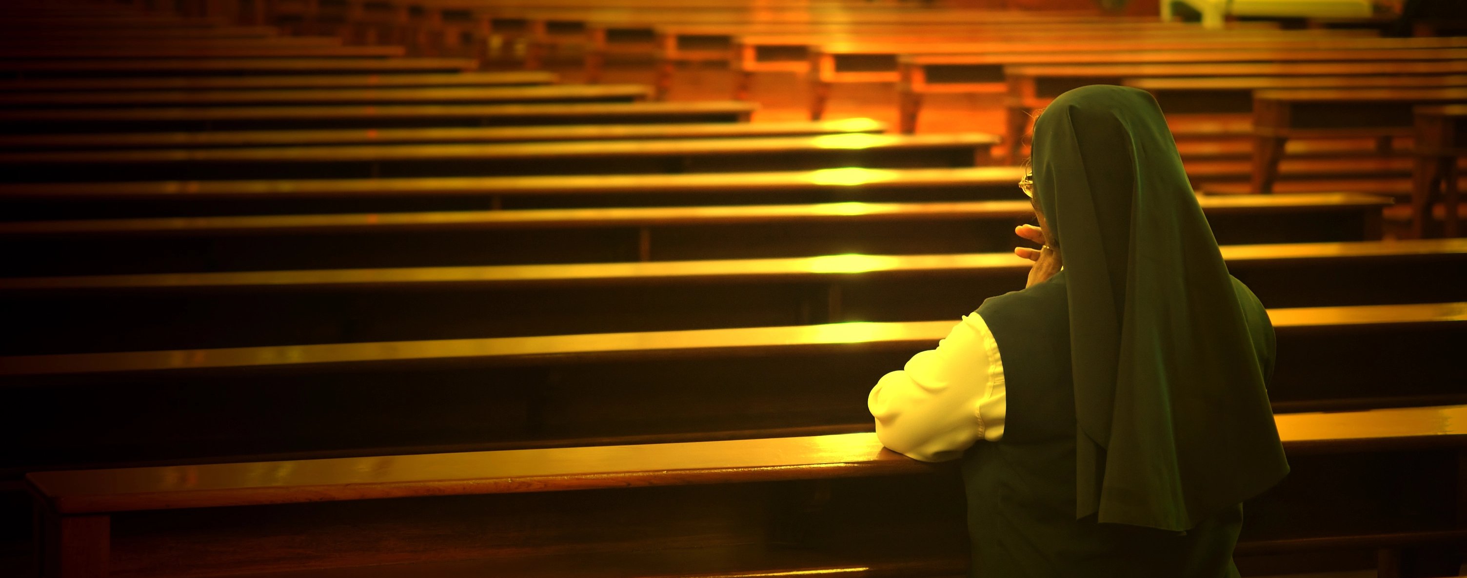 Nun praying in church. Photographer: ti to tito. Copyrighted. Licensed: DP